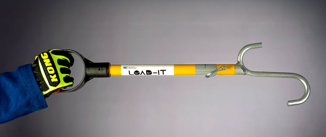 Complete PSC Load-It XT S-hook tool with D-handle held by a gloved operator